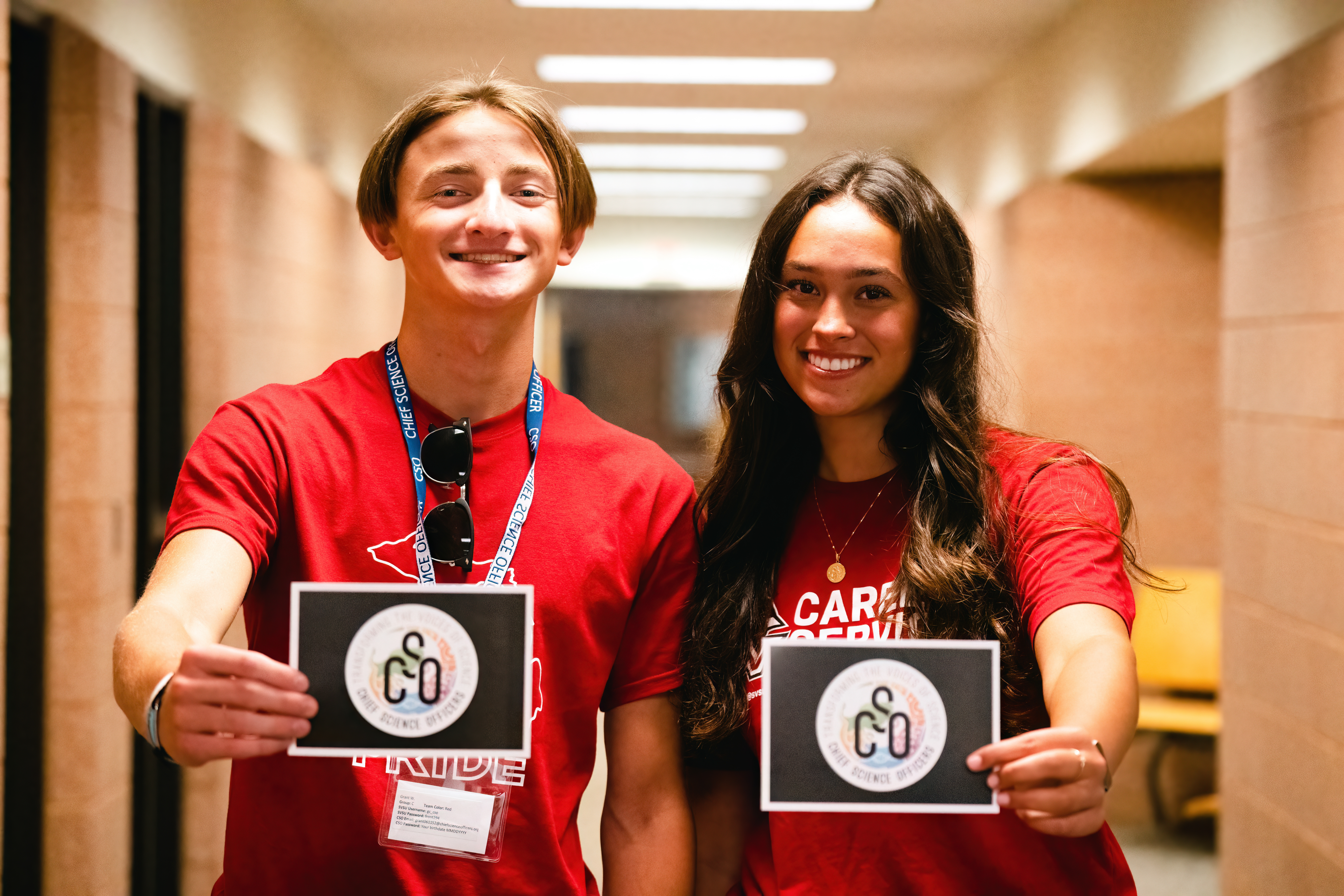 CSO students holding postcards